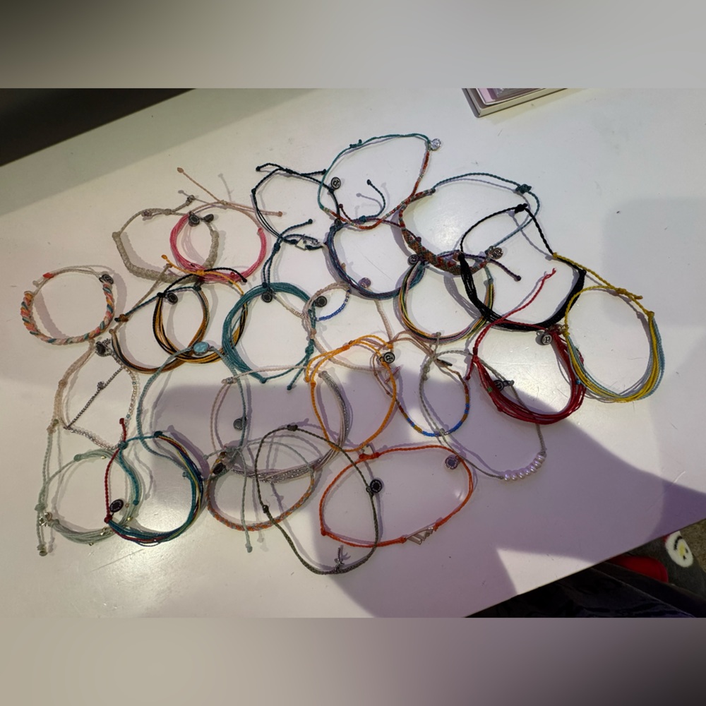 95 pura Vida bracelets over half of them never worn.